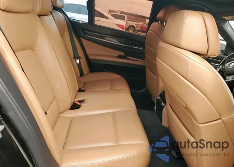 2012 BMW 750 I z USA, uszkodzony, nr VIN WBAKA8C55CDY99931